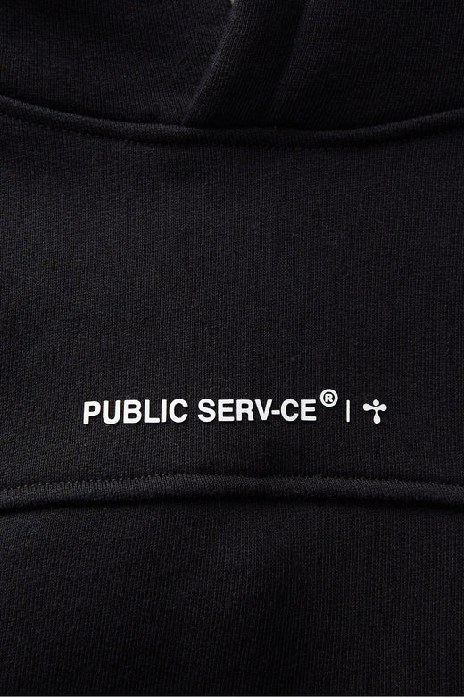 alt="detail of black hooded sweatshirt front print"